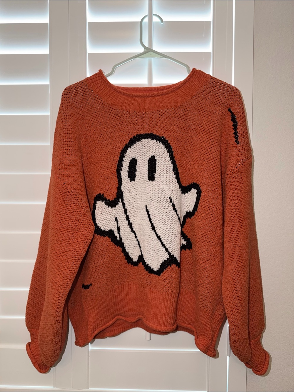 Orange Crewneck Sweater with White Ghost Motif
